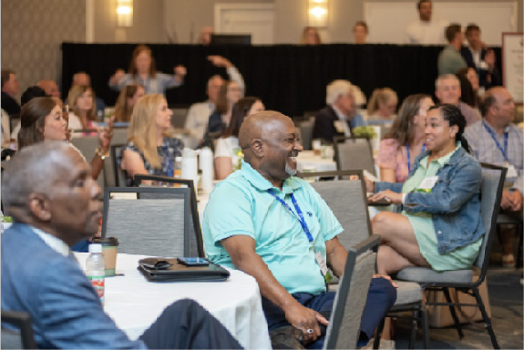 NCEDA conference attendees in a session